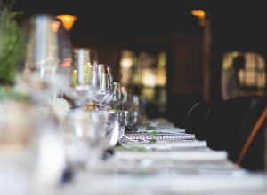 narrow depth of field shot of formal dining setup