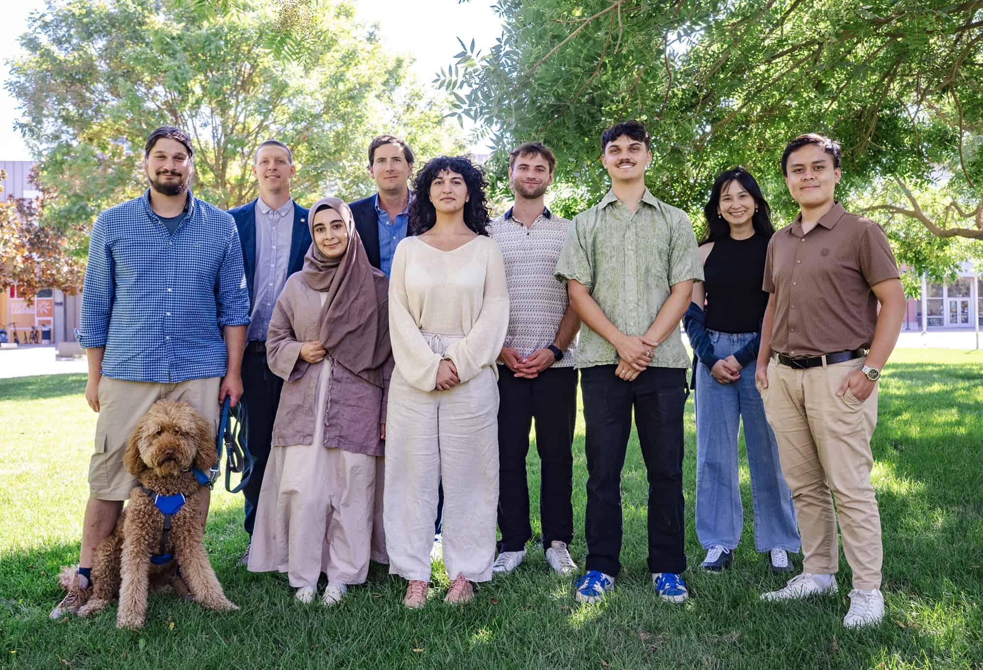 Diverse team of researchers at UC Davis Energy Efficiency Institute outdoors.