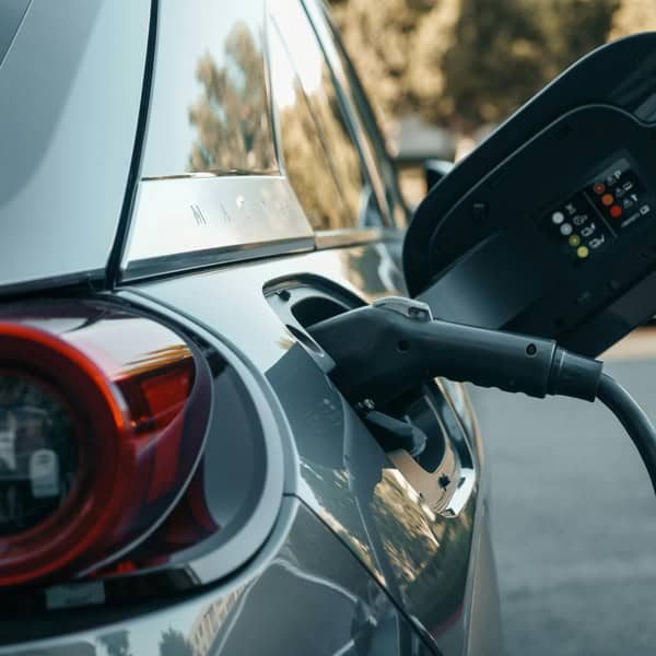 EV charging port on a modern electric car.